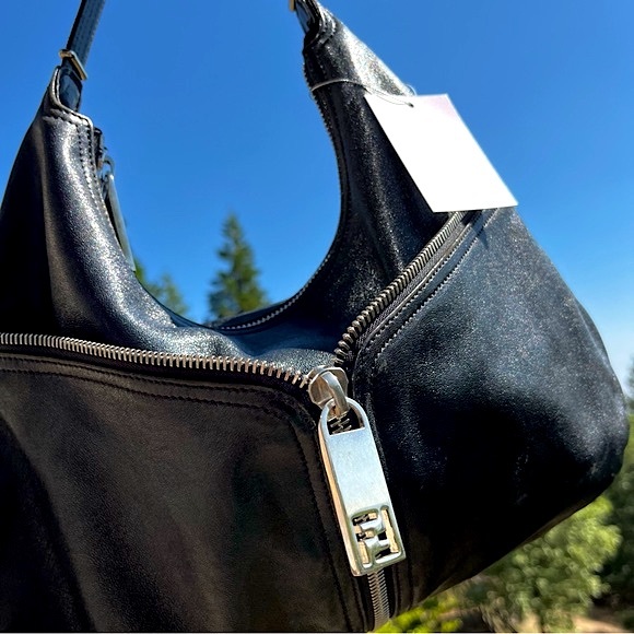 Fendi: Leather Zip Front Pocket Monogram
Hobo Bag (Black) - Picture 9 of 17